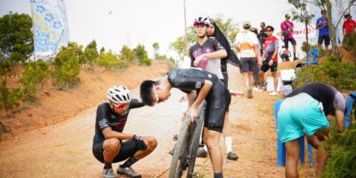 professional cyclist race day team mechanic preparation